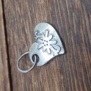 Sterling‎ silver ray of sunshine heart pendant
